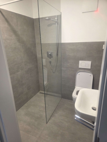 Moderne 2-Zimmer-Wohnung in Münster mit Terrasse, Tiefgaragenstellplatz in MS-Gievenbeck - Modernes Badezimmer (82839)