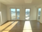 Wohnzimmer - Schöne, helle 2-Zimmer-Neubauwohnung mit Loggia!