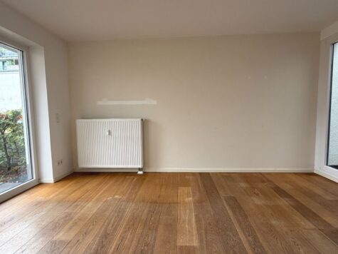 Kleine 2-Zimmer-Erdgeschosswohnung mit Atrium und Garten am Münsteraner Hafen! - Wohnzimmer aktuell (94726)