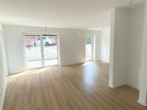 Wohnbereich - Modernes 1-Raum-Appartement mit Terrasse, Garten und EBK!