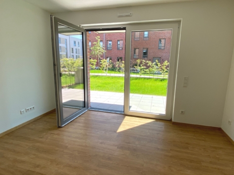 Helle, freundliche 2-Zimmer-Erdgeschosswohnung mit Terrasse und Garten! - Foto 1